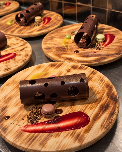 Chocolate desserts with fruit and sauce